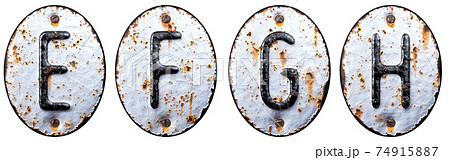 3D render set of capital letters E, F, G, H made of forged metal on the background fragment of a metal surface with cracked rust. 3D render set of capital letters E, F, G, H made of forged metal on the background fragment of a metal surface with cracked rust. 74915887
