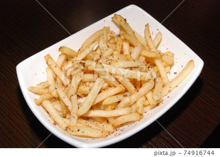 french fries in the white rectangle bowl french fries in the white rectangle bowl 74916744