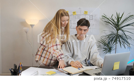 Woman and man architects discuss a joint project. 4k footage Woman and man architects discuss a joint project. 4k footage 74917510