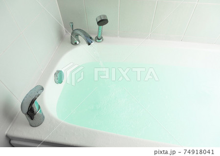 faucet and shower in a bathroom faucet and shower in a bathroom 74918041