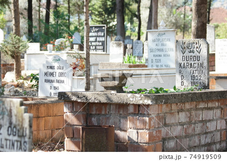 Graves and headstones at Muslim cemetery. 74919509