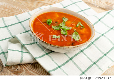 Red Tomato Soup with Barley, Potato, Carrot, Cabbage and Cereals Red Tomato Soup with Barley, Potato, Carrot, Cabbage and Cereals 74924137