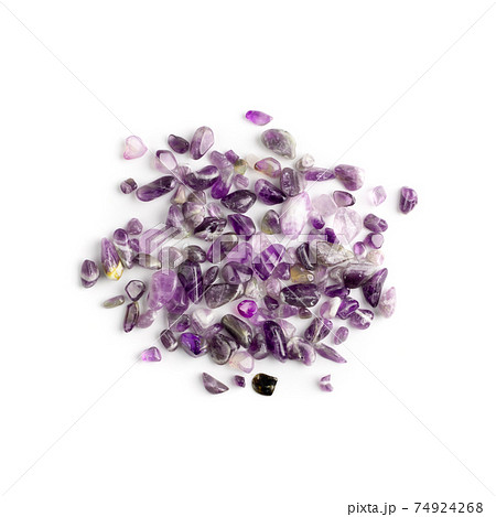 Amethyst crystals isolated. Purple quartz pebbles and crystal 74924268
