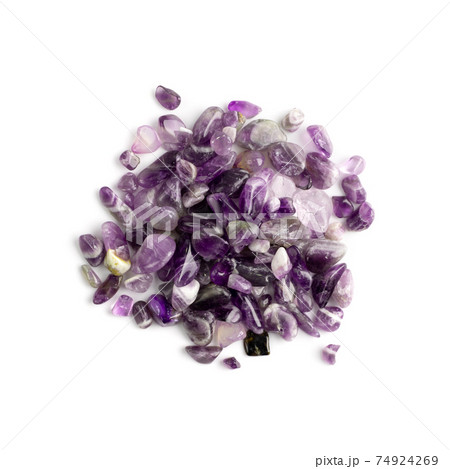 Amethyst crystals isolated. Purple quartz pebbles and crystal 74924269