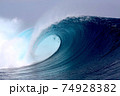 Tropical blue surfing wave 74928382