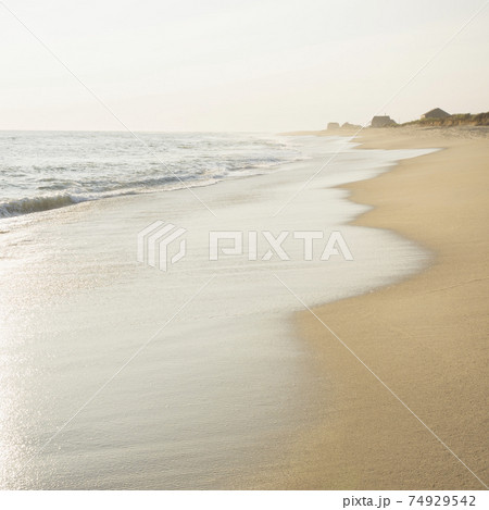 Empty beach and sea 74929542