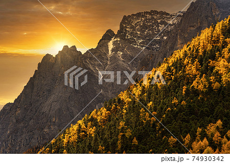 Scene of sunset at The mountain in autumn season in yading nature reserve, Daocheng County, southwest of Sichuan Province, China.travel destination and tourism,famous place and landmark concept. 74930342
