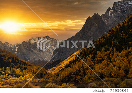 Scene of sunset at The mountain in autumn season in yading nature reserve, Daocheng County, southwest of Sichuan Province, China.travel destination and tourism,famous place and landmark concept. 74930345