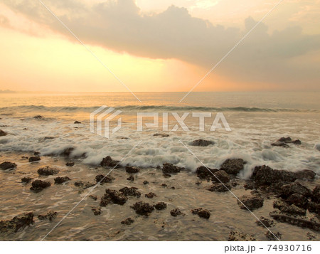 Slow shutter seascape view and beautiful sunrise 74930716