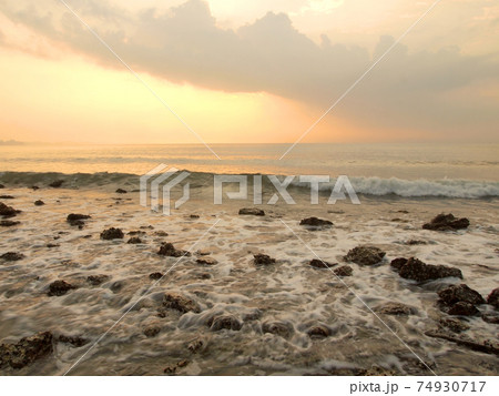 Slow shutter seascape view and beautiful sunrise 74930717