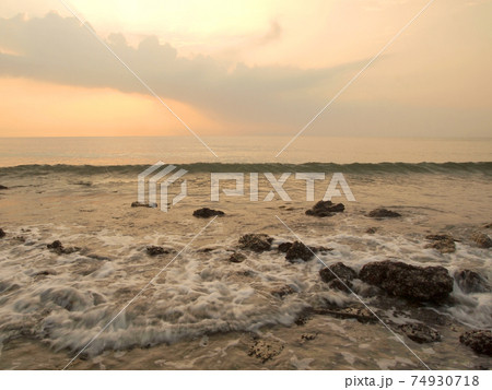 Slow shutter seascape view and beautiful sunrise 74930718