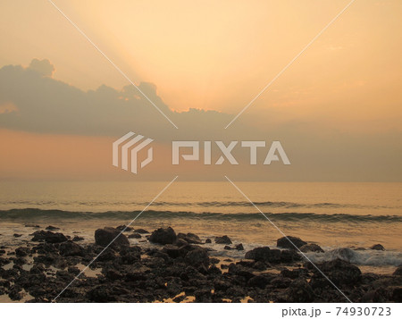 Slow shutter seascape view and beautiful sunrise 74930723