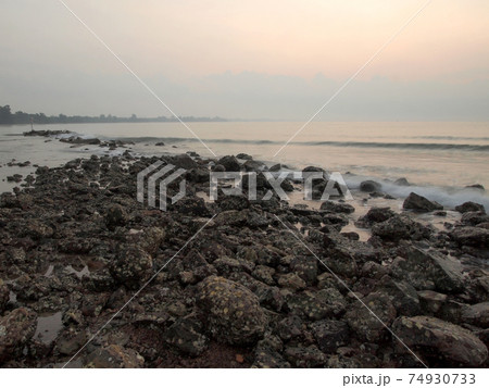 Slow shutter seascape view and beautiful sunrise 74930733