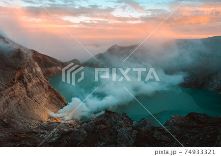 Lake and Sulfur Mine at Khawa Ijen Volcano Crater, Java Island, Indonesia Lake and Sulfur Mine at Khawa Ijen Volcano Crater, Java Island, Indonesia 74933321