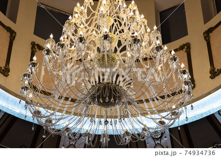 Luxury crystal chandelier. Warm shade. 74934736
