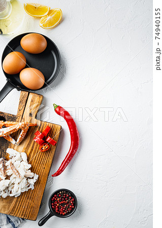 Omelette ingredients with pepper, crab meat, egg, cheese, on white background, top view flat lay , with copyspace and space for text 74940155