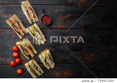 Classic club sandwich, on old wooden table, top view with copy space for text 74941364