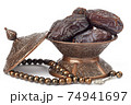 Dates on a bronze plate isolated 74941697