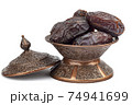 Dates on a bronze plate isolated 74941699