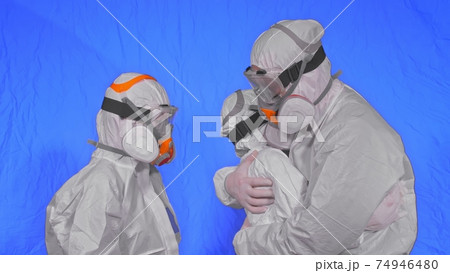 Family shield protect, to save life from virus. People portrait, wearing protect medical aerosol spray paint mask respirator. Coronavirus epidemic. Family shield protect, to save life from virus. People portrait, wearing protect medical aerosol spray paint mask respirator. Coronavirus epidemic. 74946480