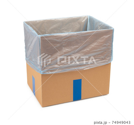 Opened cardboard box with a plastic bag inside. Isolated on white background. Opened cardboard box with a plastic bag inside. Isolated on white background. 74949043