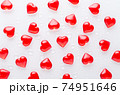 white background with red hearts pattern and water drops, flat lay 74951646