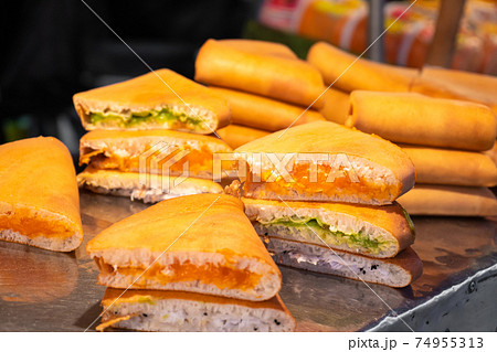 Street food market in Asia. Sandwiches with different fillings on the counter 74955313