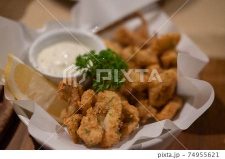 Close up of Fried Squid served on plate. 74955621