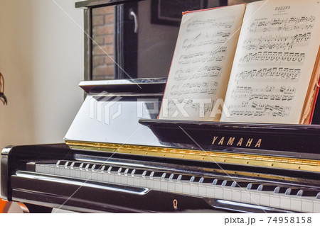 Elegant piano in a room Elegant piano in a room 74958158