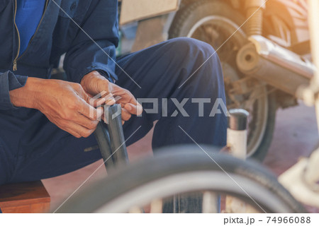 Mechanic car service auto garage in automotive mobile center. Technician workshop repair engine Mechanic car service auto garage in automotive mobile center. Technician workshop repair engine 74966088
