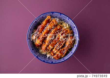 Katsudon fried chicken with rice in a bowl Katsudon fried chicken with rice in a bowl 74973649