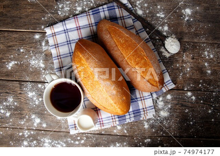 Top view on loafs of yeast-free bread with coffee 74974177