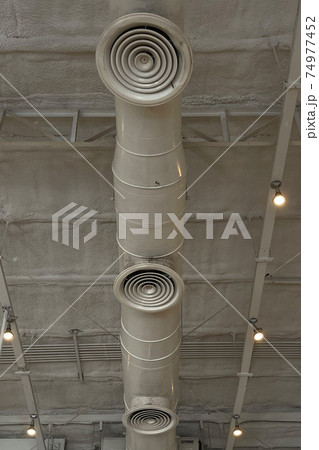 Big pipeline of air condition duct in factory theme decoration empty factory. Big pipeline of air condition duct in factory theme decoration empty factory. 74977452