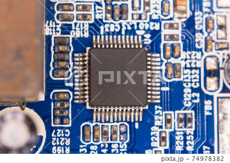 Close up blank microchip on Electronic circuit board. Close up blank microchip on Electronic circuit board. 74978382