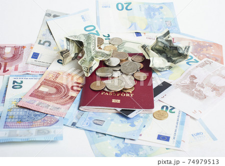 Cash on table isolated: dollars, euro, rubl broken money. All in mess, global crisis . passport travel concept Cash on table isolated: dollars, euro, rubl broken money. All in mess, global crisis . passport travel concept 74979513