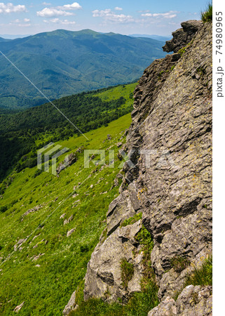Summer rocky mountain slope. Pikuj Mountain top, Carpathian, Ukraine. 74980965