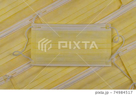 many medical protective face masks. antiviral medical mask for protection against corona virus. Surgical protective mask 74984517