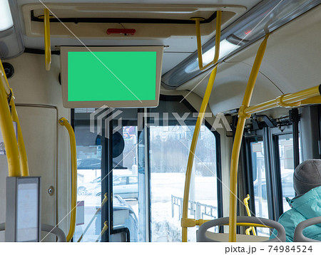information board in the bus cabin. advertising in public transport. screen on the bus, a place for advertising 74984524