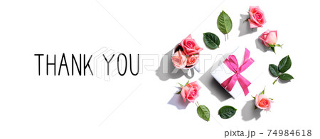 Thank you message with a gift box and roses Thank you message with a gift box and roses 74984618