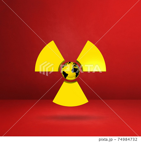 World map on Radioactive symbol. Red studio background 74984732