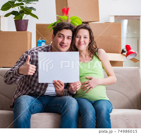Young couple expecting baby with blank message 74986015