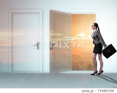 Businesswoman facing many business opportunities Businesswoman facing many business opportunities 74986398