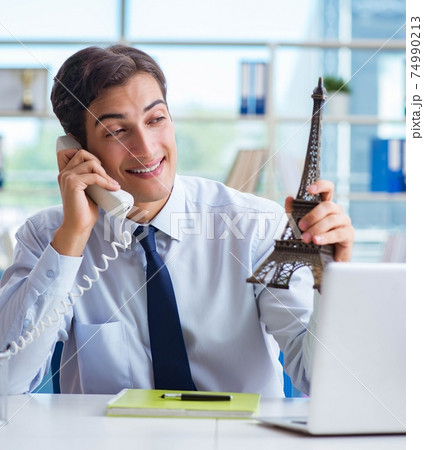 Sales agent working in travel agency 74990213