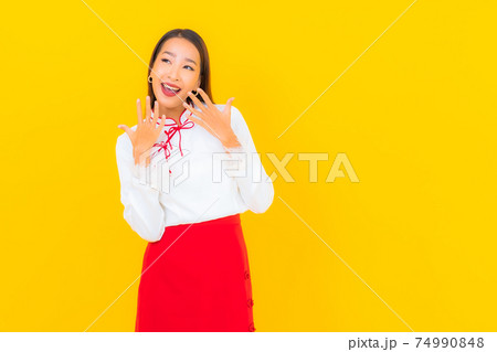 Portrait beautiful young asian woman smile in action Portrait beautiful young asian woman smile in action 74990848