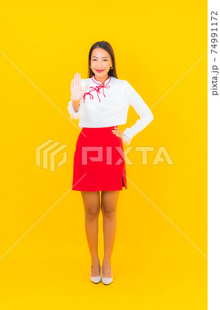Portrait beautiful young asian woman smile in action Portrait beautiful young asian woman smile in action 74991172