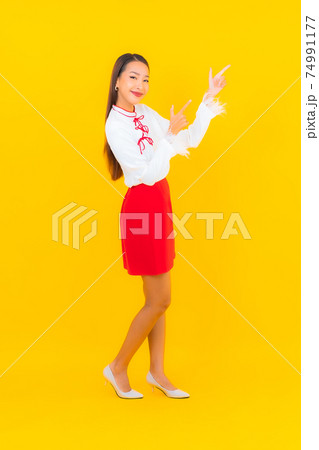 Portrait beautiful young asian woman smile in action Portrait beautiful young asian woman smile in action 74991177
