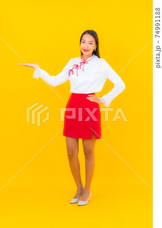 Portrait beautiful young asian woman smile in action Portrait beautiful young asian woman smile in action 74991188