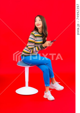 Portrait beautiful young asian woman with smart mobile phone Portrait beautiful young asian woman with smart mobile phone 74992397