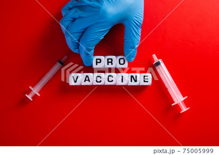 Medical covid-19 pro-vaccine concept. Pro-vaccine symbol. Doctor hand  with words 'pro-vaccine'. 75005999
