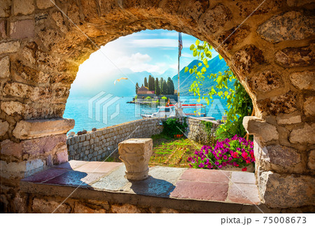 View on island through arch 75008673